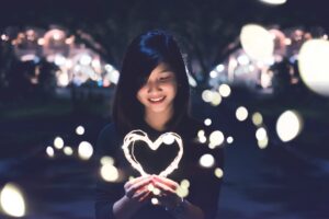 absorb kind words girl holding heart